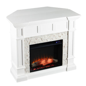 Corner-convertible electric fireplace with faux stone surround Image 4