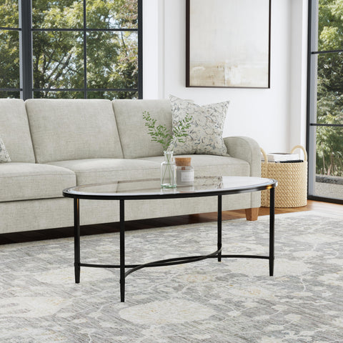 Image of Sleek, oval-shaped coffee table Image 1