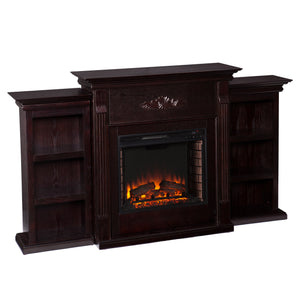 Handsome bookcase fireplace with striking woodwork details Image 4