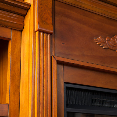 Image of Handsome bookcase fireplace with striking woodwork details Image 7