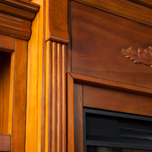 Handsome bookcase fireplace with striking woodwork details Image 7