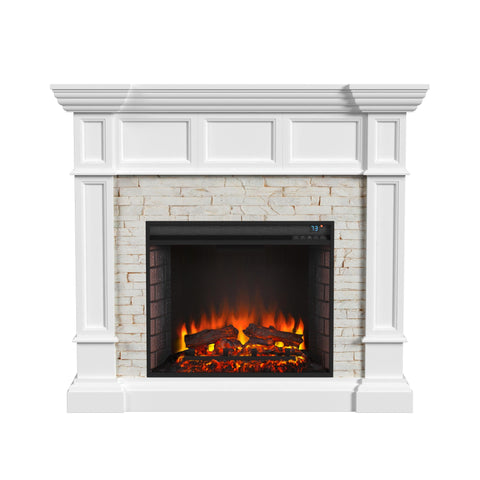 Image of Corner-convertible electric fireplace with faux stone surround Image 3