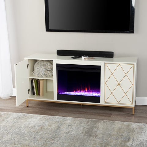 Image of Color changing media fireplace with modern gold accents Image 4