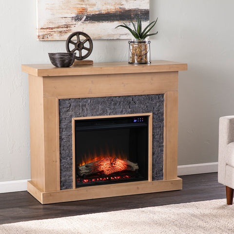 Image of Touch screen electric fireplace w/ faux stone surround Image 1