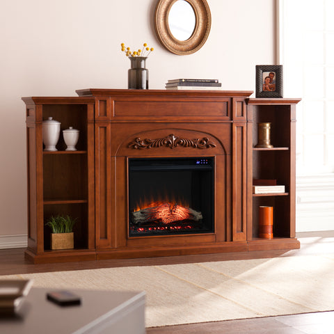 Image of Handsome bookcase fireplace w/ striking woodwork details Image 1