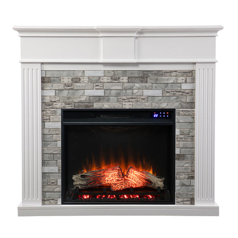 Image of Classic electric fireplace w/ modern faux stone surround Image 2