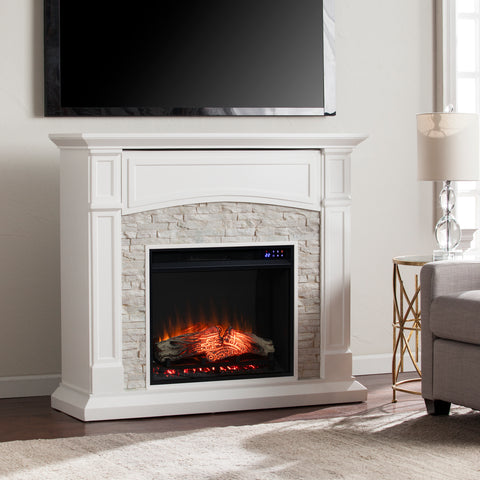 Image of Electric fireplace w/ faux stone surround Image 1