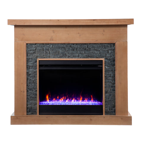 Image of Color changing fireplace w/ faux stone surround Image 4