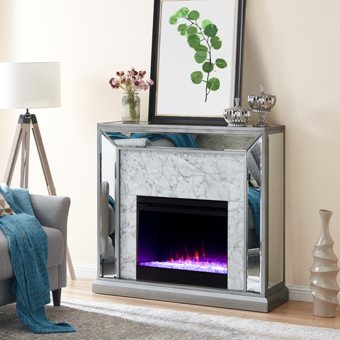 Image of Elegant mirrored fireplace mantel w/ faux stone surround Image 3