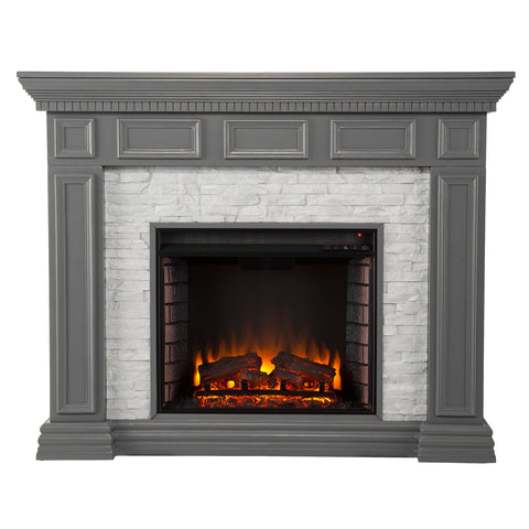 Image of Classic electric fireplace w/ stacked faux stone surround Image 4