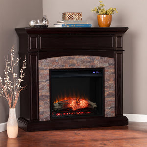 Corner convertible fireplace w/ faux stone surround Image 3