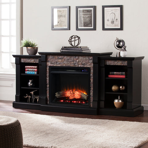 Image of Low profile bookcase fireplace w/ faux stone surround Image 1