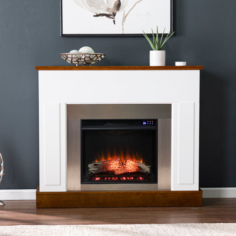 Image of Sleek electric fireplace with metallic surround Image 1