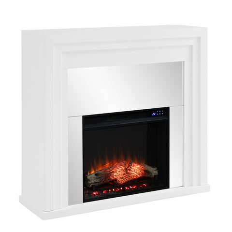 Image of Mixed material fireplace mantel w/ mirrored surround Image 4