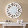 Round mirror with decorative trim Image 1