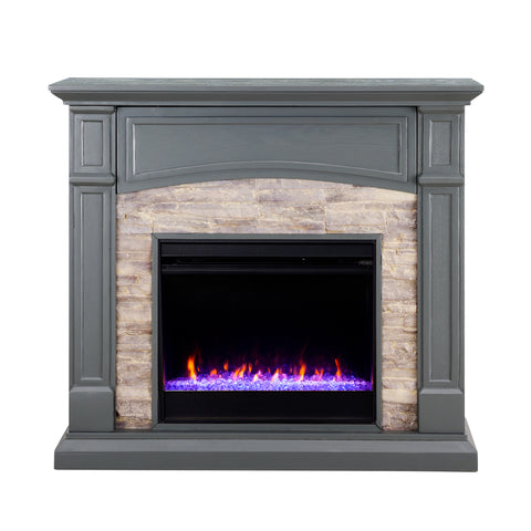 Image of Color changing fireplace w/ stacked faux stone surround Image 4