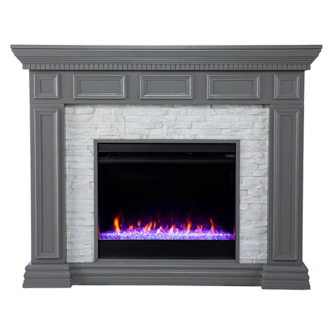 Image of Electric fireplace w/ color changing flames and faux stone surround Image 4