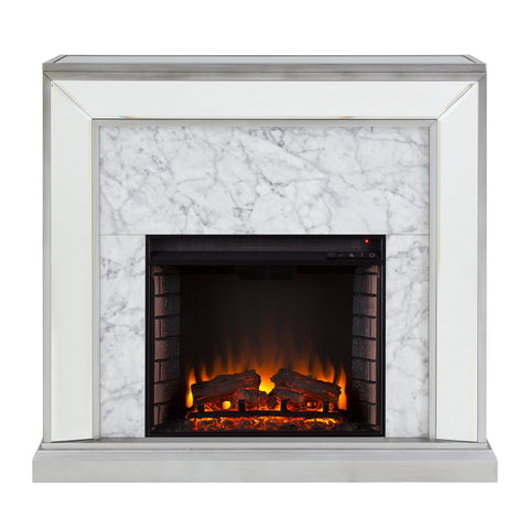 Image of Elegant mirrored fireplace mantel w/ faux stone surround Image 3