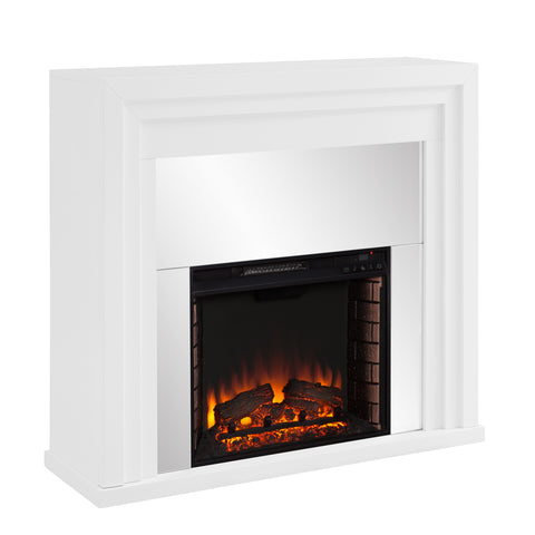 Image of Mixed material fireplace mantel w/ mirrored surround Image 4