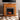 Electric fireplace w/ faux river stone surround Image 1