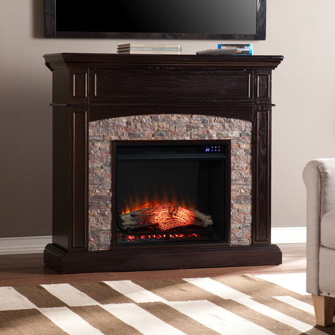 Image of Corner convertible fireplace w/ faux stone surround Image 10