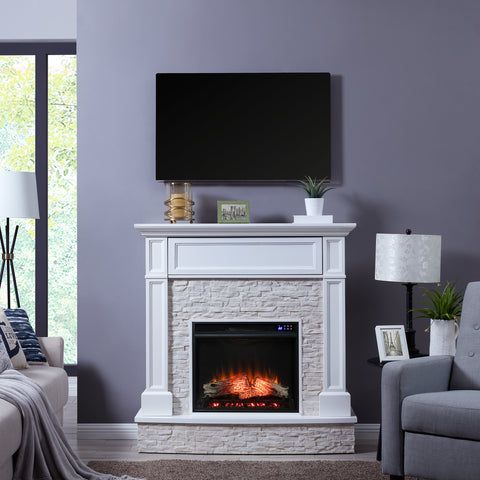 Image of Media fireplace w/ faux stone surround Image 1