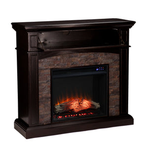 Corner convertible fireplace w/ faux stone surround Image 9