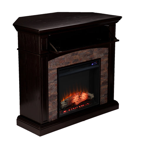 Image of Corner convertible fireplace w/ faux stone surround Image 6