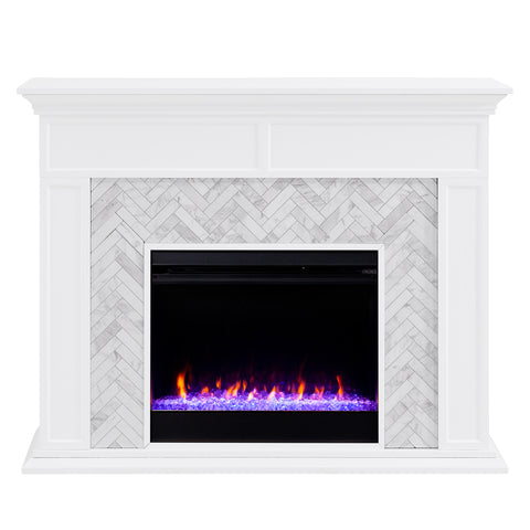 Image of Fireplace mantel w/ authentic marble surround in eye-catching herringbone layout Image 3